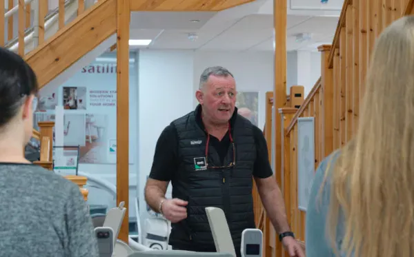 fAn EMS engineer in the EMS stairlifts showroom